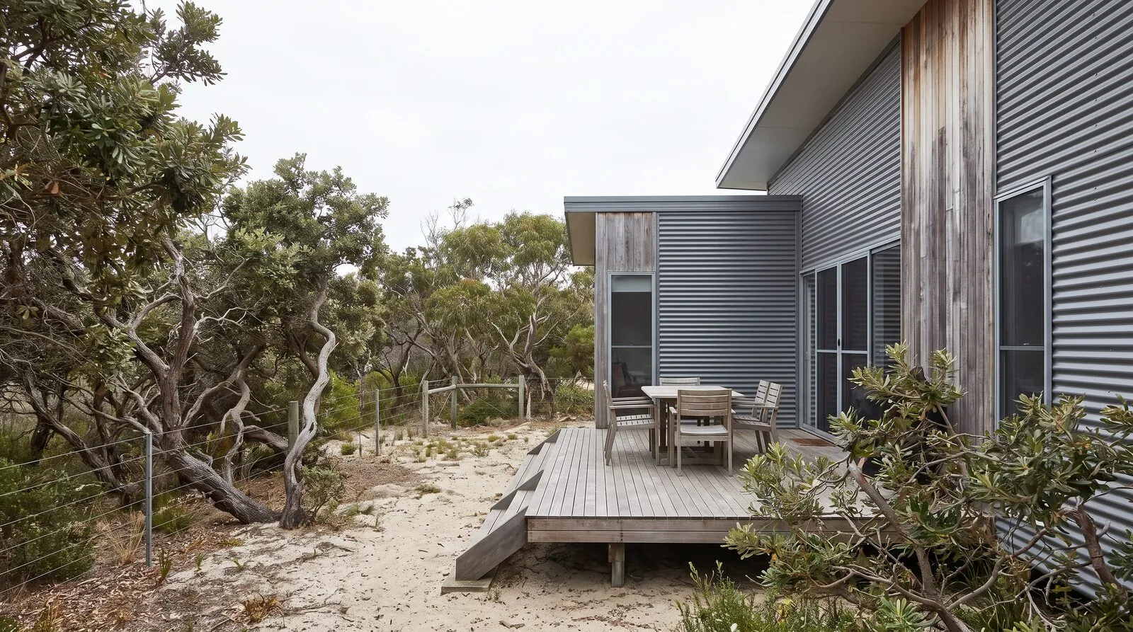 Modern home with timber deck backing onto bushland near Port Stephens