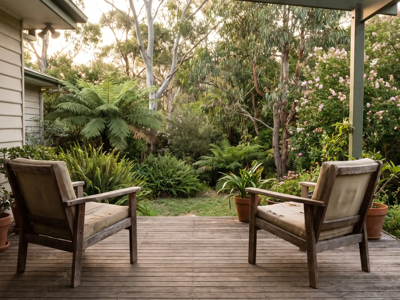 Empty backyard deck in warm evening light, ready to use